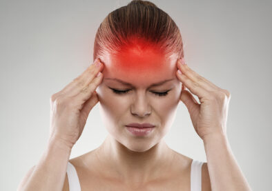 Woman having headache or dizziness problem. Health care and treatment concept.